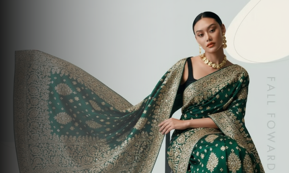 A woman wearing a royal emerald green Banarasi silk saree adorned with intricate golden zari embroidery, styled with statement jewelry — showcasing TheLavi’s premium designer saree collection.