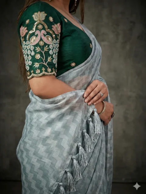 Designer embroidered blouse with grey saree